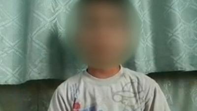 Boy who said he survived massacre in Syria