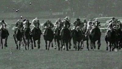 Horses racing at the Epsom Derby