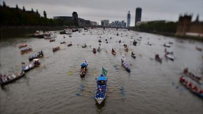 Rowing boats taking part in The Diamond Jubilee Thames Pageant