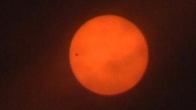 Venus makes its way across the Sun