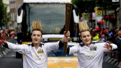 Jedward with the Olympic torch