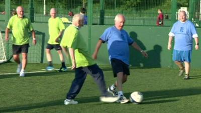 People playing walking football