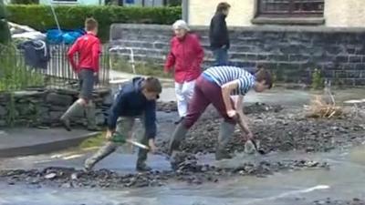 Children shovelling