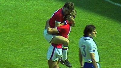 Bryan Robson celebrates his opening goal against France at 1982 World Cup