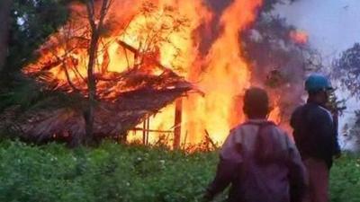 House on fire in Burma