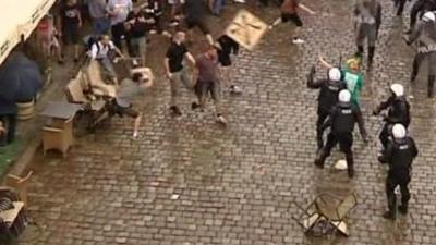 Chairs thrown at police in Poland