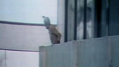 Hooded man on balcony during attack on Munich Games in 1972