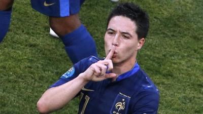 Samir Nasri celebrates scoring against England