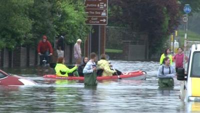 People in a canoe