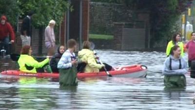 People in a canoe