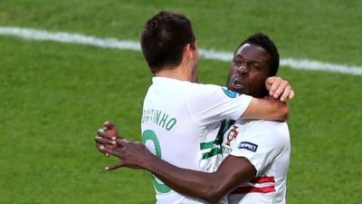 Varela and Moutinho celebrate beating Denmark