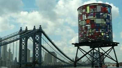 Sculpture of a water tower in Brooklyn