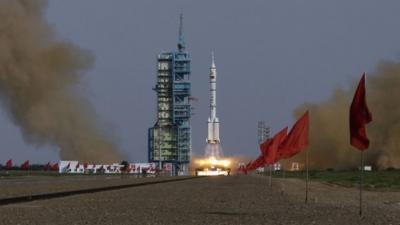 The Long March II-F rocket loaded with Shenzhou-9 manned spacecraft carrying Chinese astronauts Jing Haipeng, Liu Wang and Liu Yang lifts off from the launch pad in the Jiuquan Satellite Launch Center