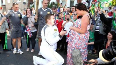 Torchbearer, David State, proposes to his girlfriend