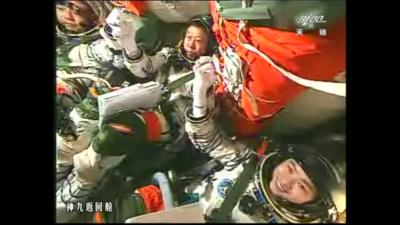 (L-R) Liu Wang, Jing Haipeng and China's first female astronaut, Liu Yang