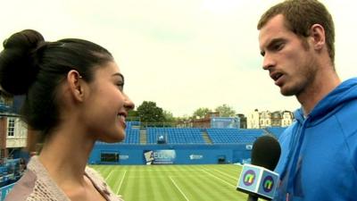 Andy Murray (R) talking to Nel (L)