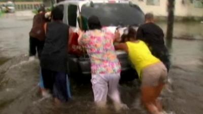 People car from flood waters