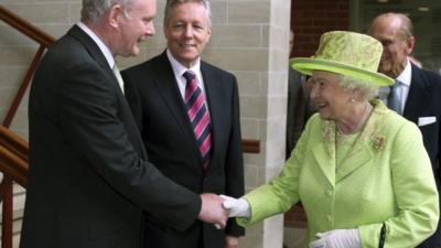 Martin McGuinness and the Queen shake hands