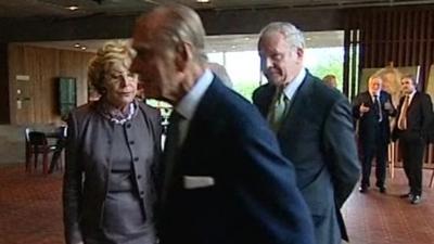 Prince Philip walks away from Martin McGuinness