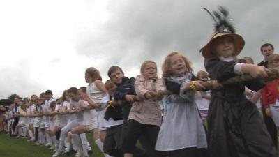 Children playing tug-of-war