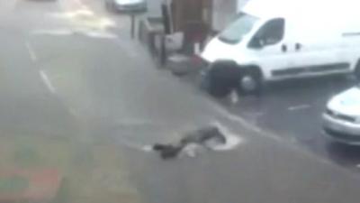 Man face down in flood water