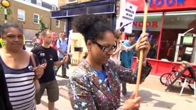 Residents holding a protest march