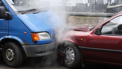 Two cars in a collision