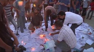 Protesters at the regional electoral authority in Benghazi