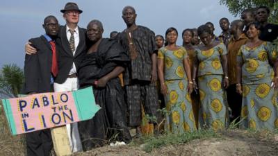 Bob and Roberta Smith and Paa Joe bury their creation