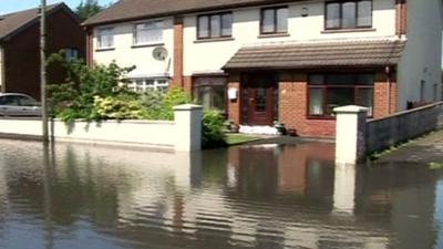 A house on a flooded street