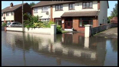 A house on a flooded street