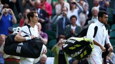 Andy Murray and Jo-Wilfried Tsonga walk on to Centre Court at Wimbldon.