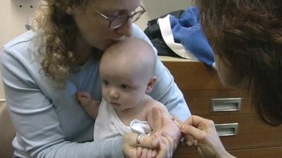 Baby given vaccination