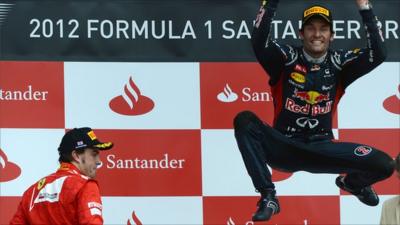 Mark Webber celebrates victory at Silverstone