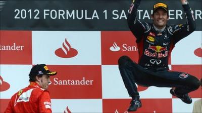 Mark Webber celebrates victory at Silverstone