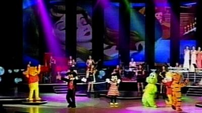 Disney characters performing on stage