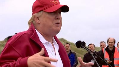 Donald Trump speaking at the opening of his golf course in Aberdeenshire