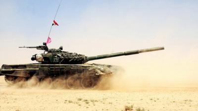 A handout picture released by the official Syrian Arab News Agency on July 8 2012, shows a Syrian army tank during military manoeuvres at an undisclosed location.