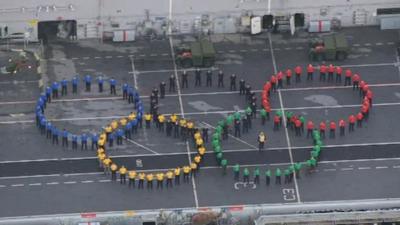 Crew of HMS Ocean form Olympic rings