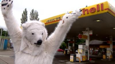 Protester at a Shell petrol station in Edinburgh