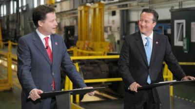 Deputy Prime Minister Nick Clegg (L) and Prime Minister David Cameron (R)