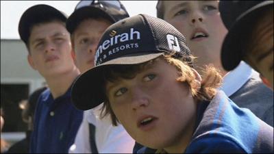 Junior members watching Rory McIlroy at Holywood Golf Club