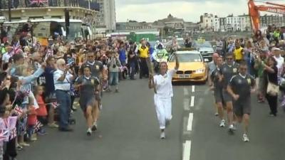 Tracey Emin carries the Olympic Torch