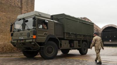 An army transport truck outside Tobacco Dock, in Wapping, east London.