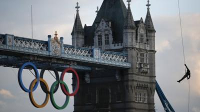Royal Marine abseils into Tower of London carrying Olympic flame