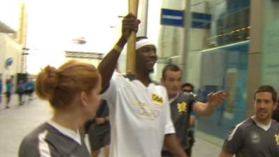 Phillips Idowu with Olympic torch