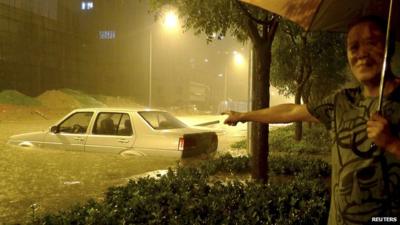 Chinese car submerged by flood