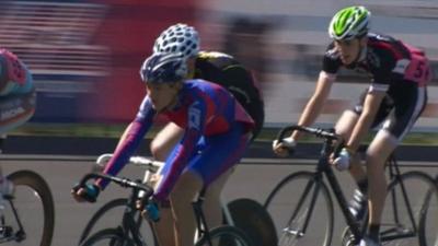 Cyclists racing on track