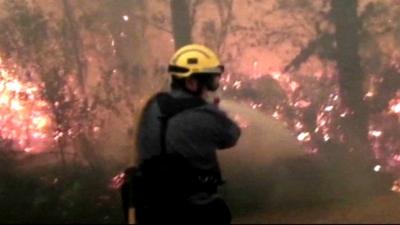 Firefighter tackles blaze