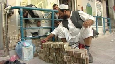 An Afghan money trader in Kabul